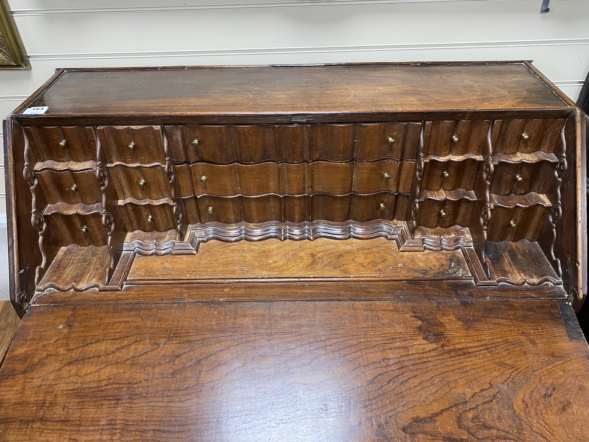 A large Spanish hardwood bureau, width 110cm, depth 48cm, height 132cm